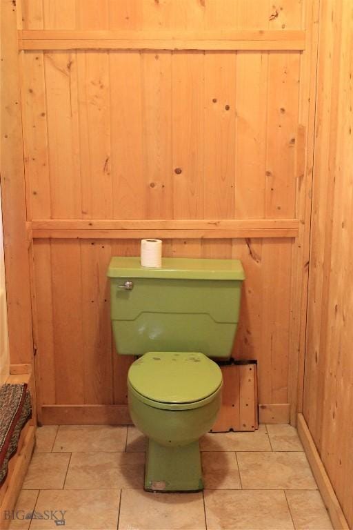524 Grizzly Meadow Rd, Emigrant, MT 59027 - bathroom featuring toilet and wood walls