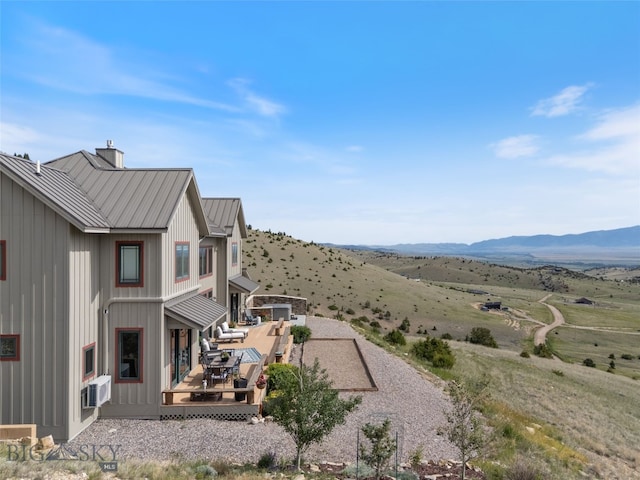 95 Foothill Trl, Ennis, MT 59729 - view of yard with a deck with mountain view