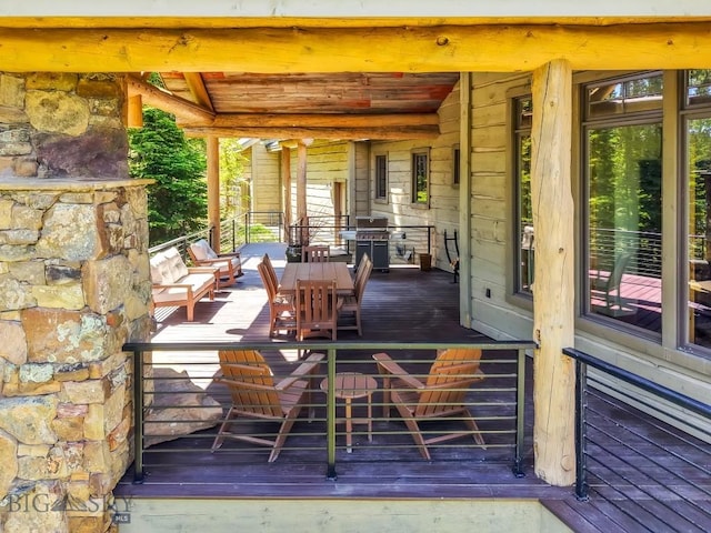 83 Peaks View Dr, Big Sky, MT 59718 - wooden deck with an outdoor hangout area and area for grilling