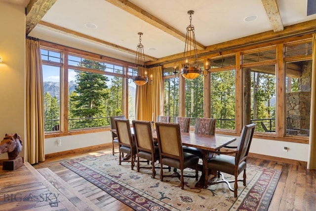 83 Peaks View Dr, Big Sky, MT 59718 - dining area featuring beamed ceiling, light wood-style floors, and a mountain view