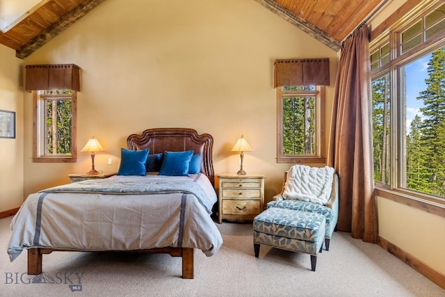 83 Peaks View Dr, Big Sky, MT 59718 - bedroom featuring wooden ceiling, multiple windows, and carpet flooring