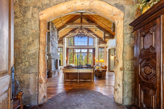 83 Peaks View Dr, Big Sky, MT 59718 - foyer entrance featuring beamed ceiling, hardwood / wood-style flooring, a chandelier, and high vaulted ceiling