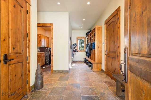 83 Peaks View Dr, Big Sky, MT 59718 - foyer entrance featuring recessed lighting and washer / dryer