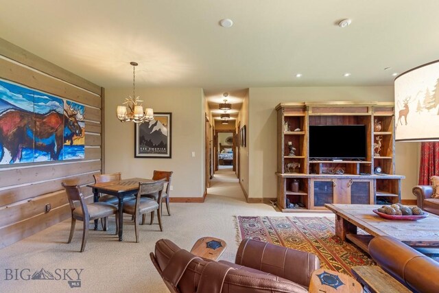 83 Peaks View Dr, Big Sky, MT 59718 - carpeted living area with a chandelier and recessed lighting