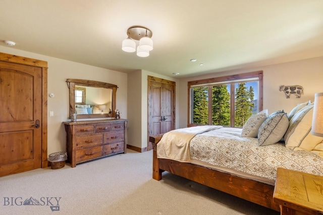 83 Peaks View Dr, Big Sky, MT 59718 - bedroom featuring light colored carpet