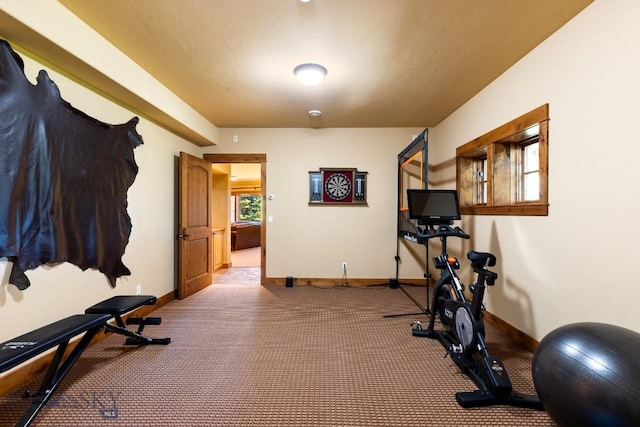 83 Peaks View Dr, Big Sky, MT 59718 - workout room featuring baseboards and carpet