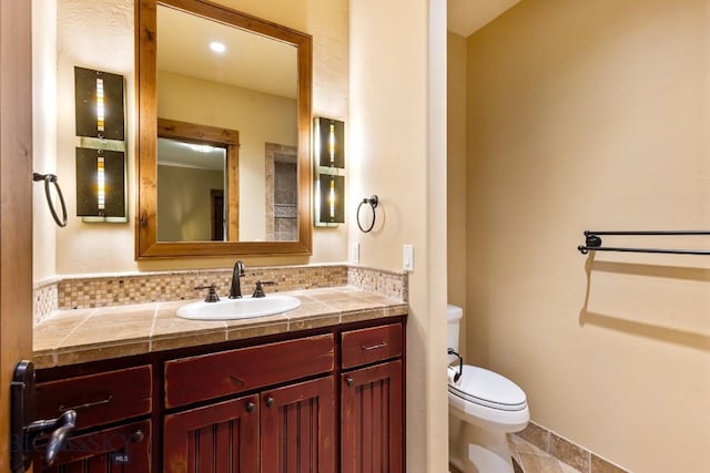 83 Peaks View Dr, Big Sky, MT 59718 - bathroom featuring vanity and decorative backsplash