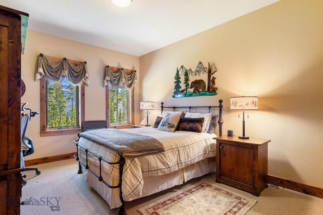 83 Peaks View Dr, Big Sky, MT 59718 - bedroom featuring light colored carpet