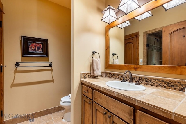 83 Peaks View Dr, Big Sky, MT 59718 - bathroom with vanity, a skylight, tile patterned floors, and a shower