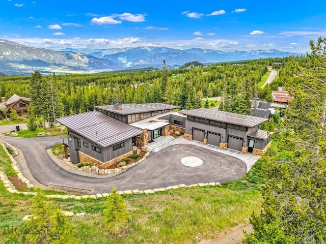 93 Goshawk Trl, Big Sky, MT 59716 - aerial view of property and surrounding area with a mountain backdrop
