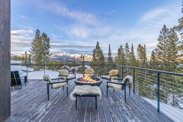 93 Goshawk Trl, Big Sky, MT 59716 - deck with a fire pit