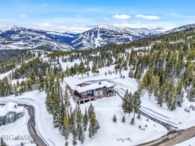 93 Goshawk Trl, Big Sky, MT 59716 - snowy aerial view with a mountain view