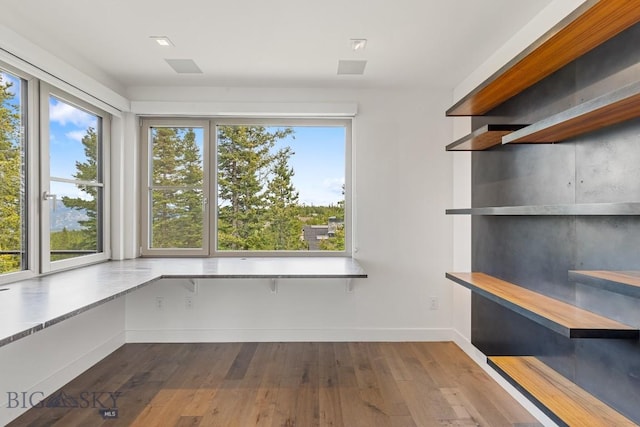 93 Goshawk Trl, Big Sky, MT 59716 - unfurnished office featuring hardwood / wood-style floors and baseboards