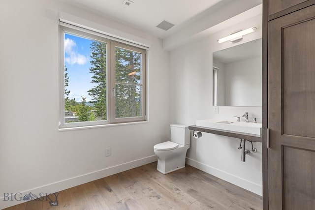 93 Goshawk Trl, Big Sky, MT 59716 - bathroom featuring wood finished floors