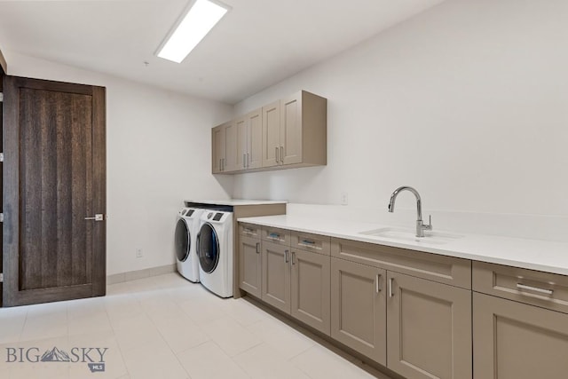 93 Goshawk Trl, Big Sky, MT 59716 - laundry room with washer and clothes dryer and cabinet space