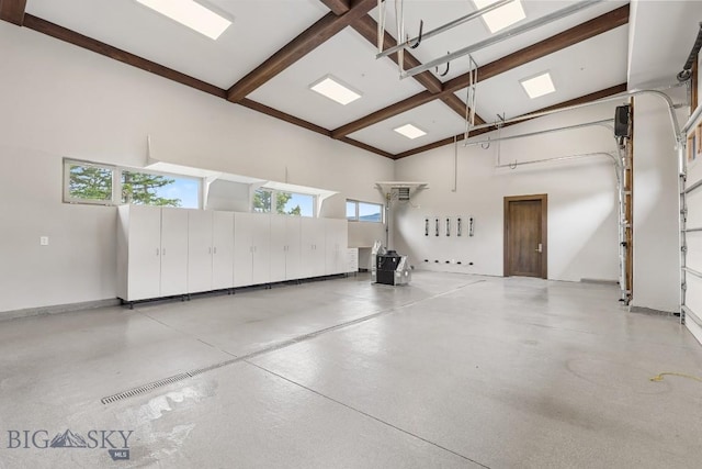 93 Goshawk Trl, Big Sky, MT 59716 - garage featuring baseboards