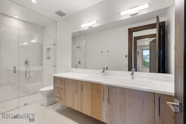 93 Goshawk Trl, Big Sky, MT 59716 - full bathroom with vanity, a shower stall, and tile patterned floors
