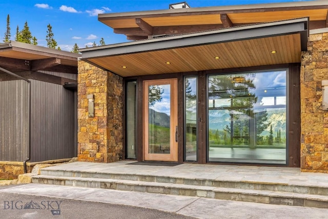 93 Goshawk Trl, Big Sky, MT 59716 - property entrance with stone siding