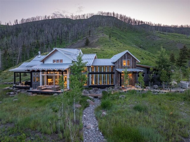 225 Alpen Strasse St, Bozeman, MT 59715 - rear view of house with a metal roof and a mountain view