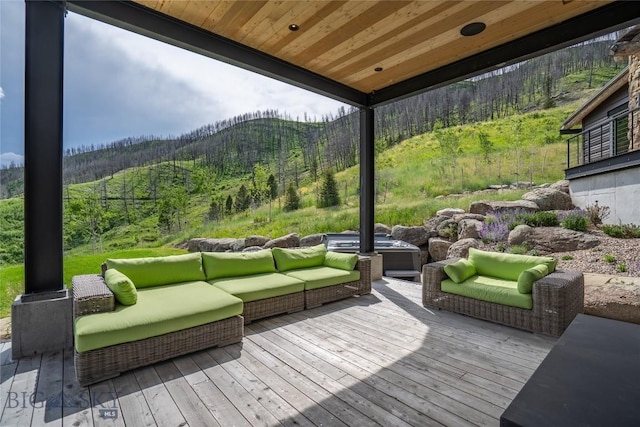 225 Alpen Strasse St, Bozeman, MT 59715 - wooden deck with an outdoor living space, a forest view, and a mountain view