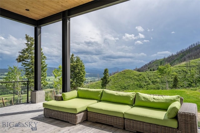 225 Alpen Strasse St, Bozeman, MT 59715 - view of patio / terrace featuring an outdoor living space, a deck, and a view of trees
