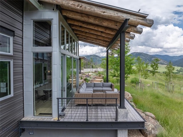 225 Alpen Strasse St, Bozeman, MT 59715 - wooden terrace featuring a mountain view and outdoor lounge area
