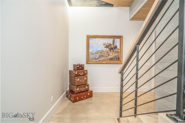 225 Alpen Strasse St, Bozeman, MT 59715 - stairs with baseboards and concrete floors