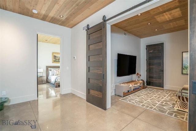 225 Alpen Strasse St, Bozeman, MT 59715 - living area featuring wooden ceiling, a barn door, and recessed lighting