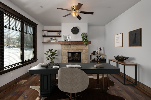 661 Doney Way, Bozeman, MT 59718 - office space with a stone fireplace, ceiling fan, and wood finished floors