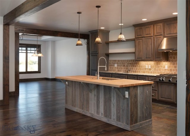 661 Doney Way, Bozeman, MT 59718 - kitchen with extractor fan, stainless steel gas cooktop, wood counters, decorative backsplash, and open shelves