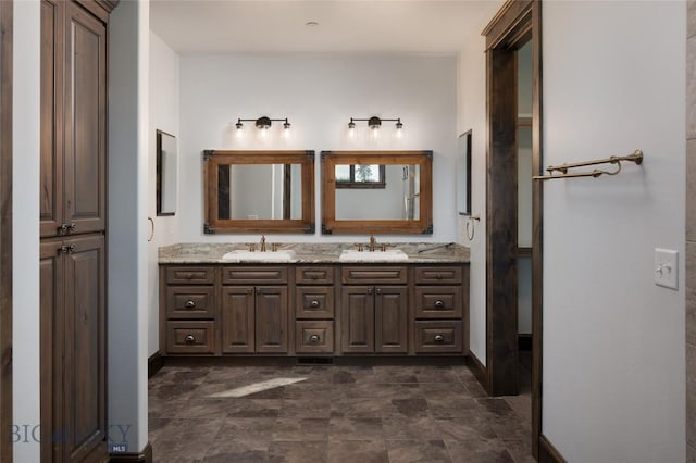 661 Doney Way, Bozeman, MT 59718 - bathroom with double vanity and baseboards