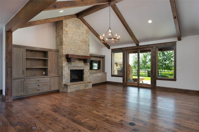 661 Doney Way, Bozeman, MT 59718 - unfurnished living room with a chandelier, a fireplace, and dark wood-type flooring