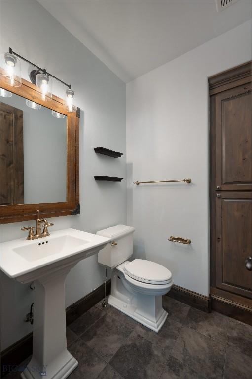 661 Doney Way, Bozeman, MT 59718 - half bath with baseboards and toilet