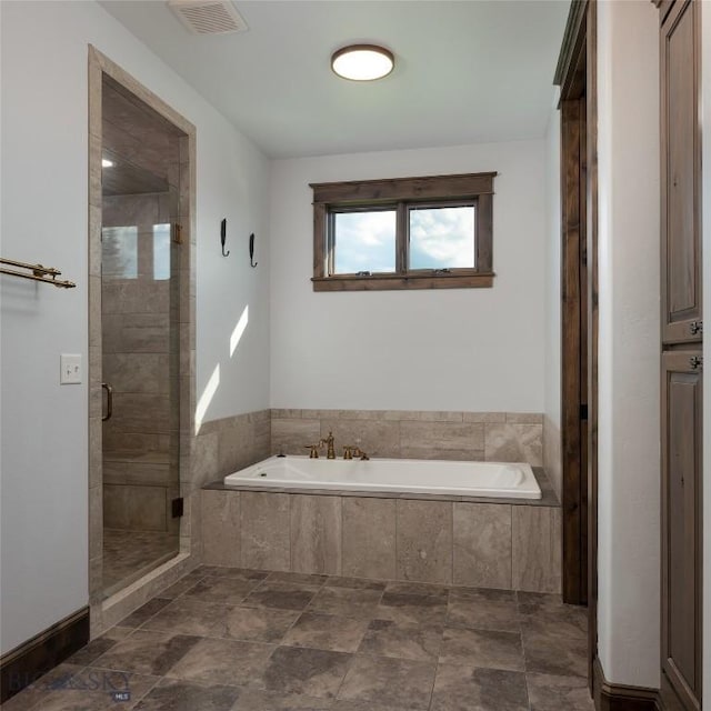 661 Doney Way, Bozeman, MT 59718 - bathroom with a garden tub and a shower stall