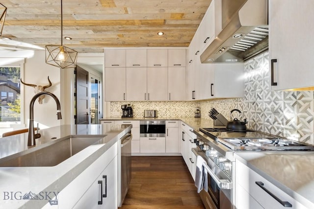 425 Outlook Trl, Big Sky, MT 59716 - kitchen featuring exhaust hood, appliances with stainless steel finishes, wooden ceiling, decorative light fixtures, and dark wood-type flooring