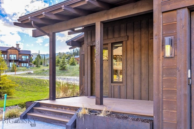 425 Outlook Trl, Big Sky, MT 59716 - property entrance featuring board and batten siding