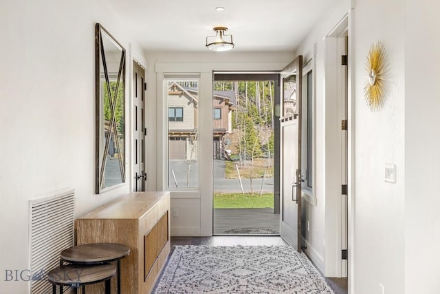 425 Outlook Trl, Big Sky, MT 59716 - doorway to outside featuring baseboards