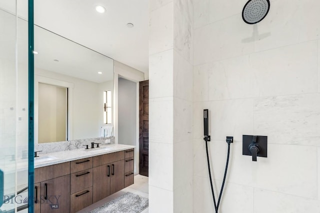 425 Outlook Trl, Big Sky, MT 59716 - full bathroom featuring tiled shower, double vanity, and recessed lighting
