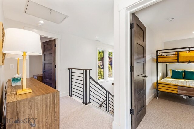425 Outlook Trl, Big Sky, MT 59716 - hall featuring an upstairs landing, carpet flooring, and recessed lighting
