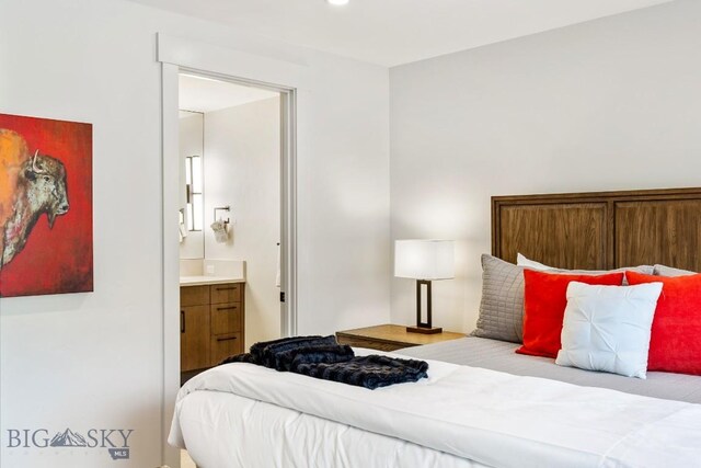 425 Outlook Trl, Big Sky, MT 59716 - bedroom with ensuite bathroom and recessed lighting