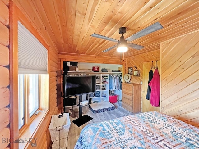143 Aurora Ln, Dillon, MT 59725 - bedroom featuring wood ceiling, wood walls, wood finished floors, and ceiling fan