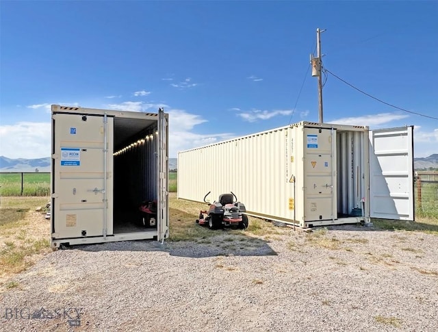 143 Aurora Ln, Dillon, MT 59725 - view of outdoor structure featuring a mountain view