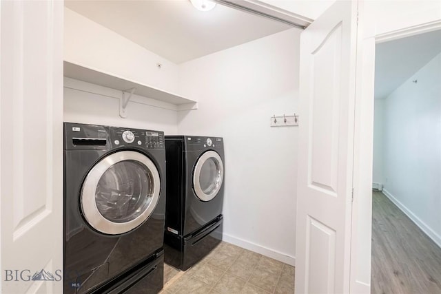 1010 Cruiser Ln Unit M, Belgrade, MT 59714 - washroom with separate washer and dryer and baseboards