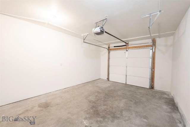 1010 Cruiser Ln Unit M, Belgrade, MT 59714 - garage featuring a garage door opener