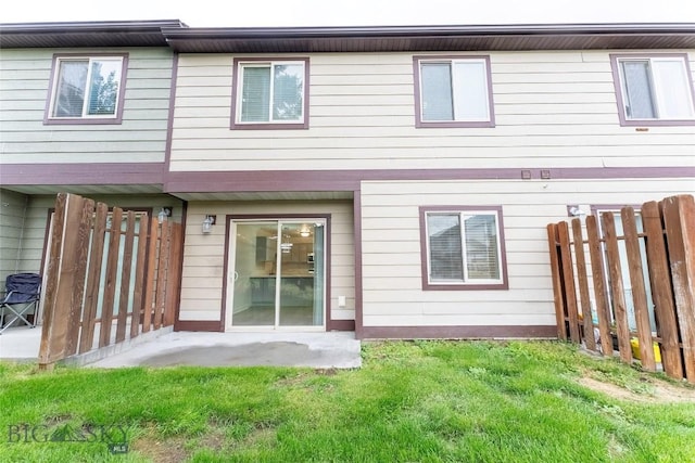 1010 Cruiser Ln Unit M, Belgrade, MT 59714 - back of property featuring a patio