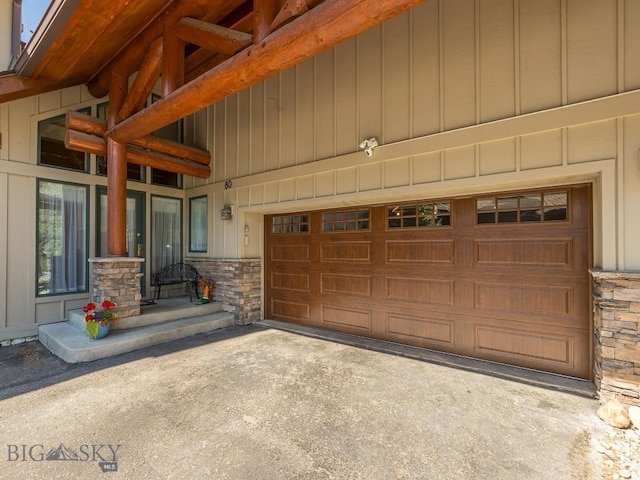 80 Crail Creek Ct Unit 616, Big Sky, MT 59716 - garage featuring concrete driveway