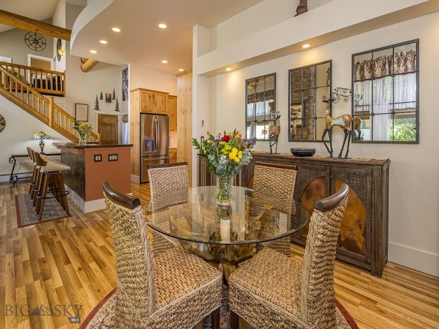 80 Crail Creek Ct Unit 616, Big Sky, MT 59716 - dining area featuring stairs, light wood finished floors, recessed lighting, and baseboard heating