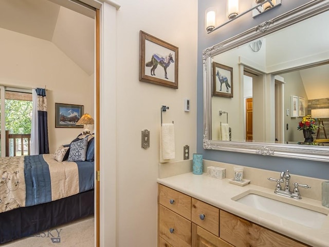 80 Crail Creek Ct Unit 616, Big Sky, MT 59716 - ensuite bathroom featuring vanity and vaulted ceiling