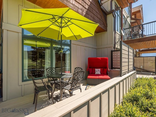 80 Crail Creek Ct Unit 616, Big Sky, MT 59716 - wooden terrace featuring an outdoor living space