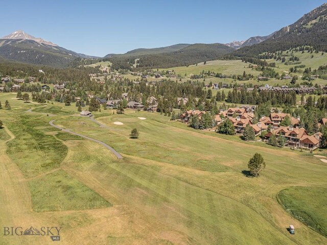 80 Crail Creek Ct Unit 616, Big Sky, MT 59716 - aerial view of property and surrounding area with a mountainous background and nearby suburban area